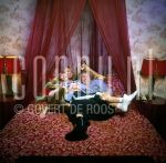 11-01-2003 Familie Paay Curry Patricia Paay, Adam Curry and Christina at home in Belgium. January 11, 2003.

[keywords]Bedroom, Laughing, On Bed[/keywords]